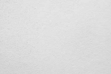 Beyaz beton duvarın pürüzsüz dokusu kaba bir yüzey, metin için boşluk, arkaplan için alan.