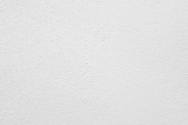Beyaz beton duvarın pürüzsüz dokusu kaba bir yüzey, metin için boşluk, arkaplan için alan.