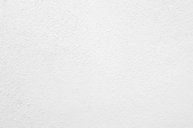 Beyaz beton duvarın pürüzsüz dokusu kaba bir yüzey, metin için boşluk, arkaplan için alan.