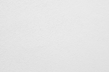 Seamless texture of white cement wall a rough surface, with space for text, for a background.	