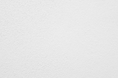 Seamless texture of white cement wall a rough surface, with space for text, for a background.	