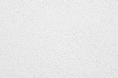 Seamless texture of white cement wall a rough surface, with space for text, for a background.	