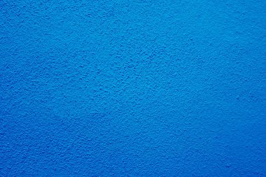 Seamless texture of blue cement wall a rough surface, with space for text, for a background.	