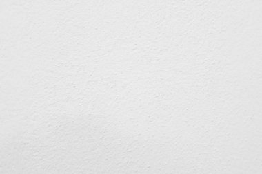 Seamless texture of white cement wall a rough surface, with space for text, for a background.	