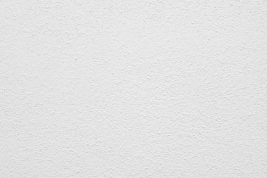 Seamless texture of white cement wall a rough surface, with space for text, for a background.	