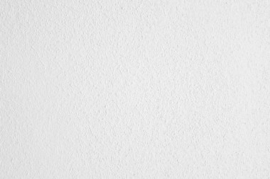Seamless texture of white cement wall a rough surface, with space for text, for a background.	