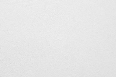 Seamless texture of white cement wall a rough surface, with space for text, for a background.	