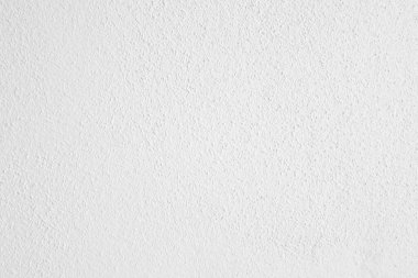 Seamless texture of white cement wall a rough surface, with space for text, for a background.	