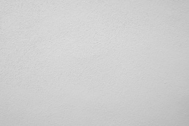 Beyaz beton duvarın pürüzsüz dokusu kaba bir yüzey, metin için boşluk, arkaplan için alan.
