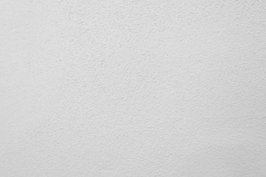 Beyaz beton duvarın pürüzsüz dokusu kaba bir yüzey, metin için boşluk, arkaplan için alan.