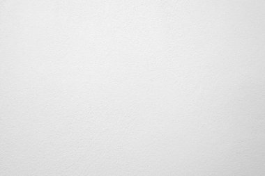 Beyaz beton duvarın pürüzsüz dokusu kaba bir yüzey, metin için boşluk, arkaplan için alan.