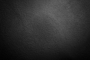 Seamless texture of black cement wall a rough surface, with space for text, for a background.	