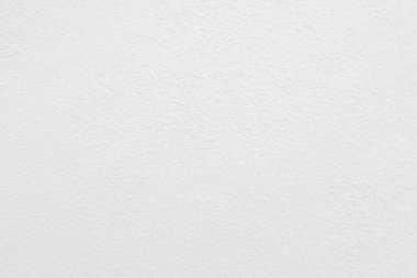 Beyaz beton duvarın pürüzsüz dokusu kaba bir yüzey, metin için boşluk, arkaplan için alan.