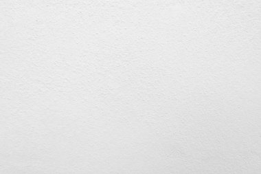 Beyaz beton duvarın pürüzsüz dokusu kaba bir yüzey, metin için boşluk, arkaplan için alan.