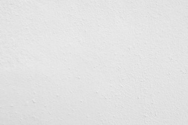 Beyaz beton duvarın pürüzsüz dokusu kaba bir yüzey, metin için boşluk, arkaplan için alan.