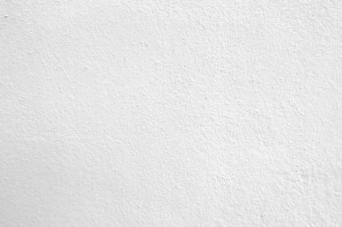 Beyaz beton duvarın pürüzsüz dokusu kaba bir yüzey, metin için boşluk, arkaplan için alan.