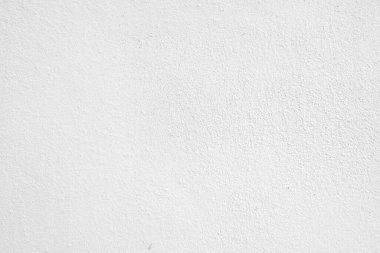 Seamless texture of white cement wall a rough surface, with space for text, for a background.	