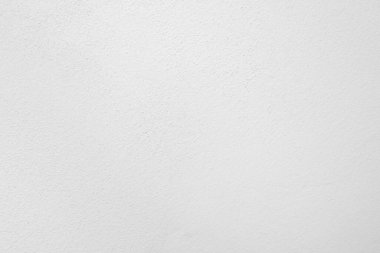 Beyaz beton duvarın pürüzsüz dokusu kaba bir yüzey, metin için boşluk, arkaplan için alan.