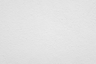 Seamless texture of white cement wall a rough surface, with space for text, for a background.	