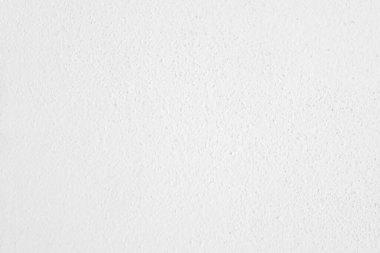 Seamless texture of white cement wall a rough surface, with space for text, for a background.	