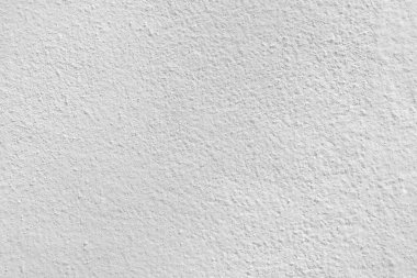 Beyaz beton duvarın pürüzsüz dokusu kaba bir yüzey, metin için boşluk, arkaplan için alan.