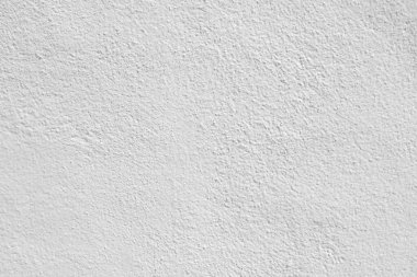 Beyaz beton duvarın pürüzsüz dokusu kaba bir yüzey, metin için boşluk, arkaplan için alan.