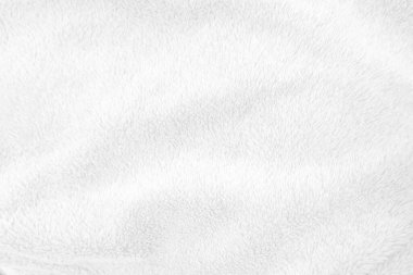 Beyaz, temiz yün dokusu arka planda. hafif doğal koyun yünü. Beyaz, pürüzsüz pamuk. Tasarımcılar için tüylü kürk dokusu. yakın plan beyaz yün halı..