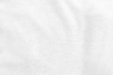 Beyaz, temiz yün dokusu arka planda. hafif doğal koyun yünü. Beyaz, pürüzsüz pamuk. Tasarımcılar için tüylü kürk dokusu. yakın plan beyaz yün halı..
