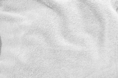 Beyaz, temiz yün dokusu arka planda. hafif doğal koyun yünü. Beyaz, pürüzsüz pamuk. Tasarımcılar için tüylü kürk dokusu. yakın plan beyaz yün halı..