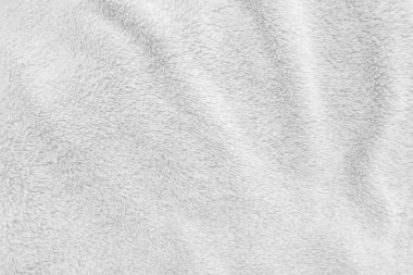 White clean wool texture background. light natural sheep wool. white seamless cotton. texture of fluffy fur for designers. close-up fragment white wool carpet.	