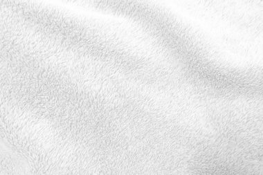 White clean wool texture background. light natural sheep wool. white seamless cotton. texture of fluffy fur for designers. close-up fragment white wool carpet.	