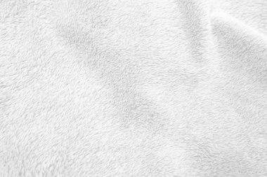 White clean wool texture background. light natural sheep wool. white seamless cotton. texture of fluffy fur for designers. close-up fragment white wool carpet.	
