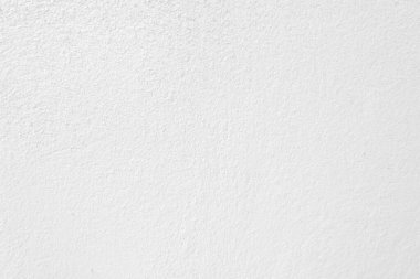 Seamless texture of white cement wall a rough surface, with space for text, for a background.	