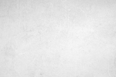 Seamless texture of white cement wall a rough surface, with space for text, for a background.	