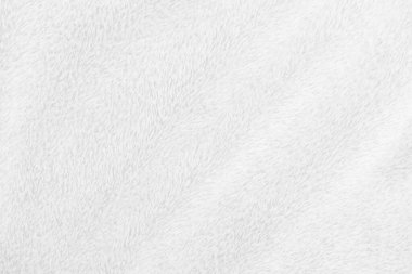 White clean wool texture background. light natural sheep wool. white seamless cotton. texture of fluffy fur for designers. close-up fragment white wool carpet.	