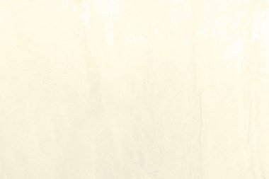 Beyaz, ısınan taş dokunun yüzeyi pürüzlü, gri-beyaz tonda. Duvar kağıdı veya arkaplan resmi için bunu kullanın. Metin için boş bir boşluk var