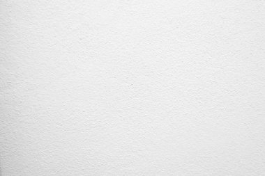 Beyaz beton duvarın pürüzsüz dokusu kaba bir yüzey, metin için boşluk, arkaplan için alan.