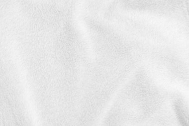 White clean wool texture background. light natural sheep wool. white seamless cotton. texture of fluffy fur for designers. close-up fragment white wool carpet.	