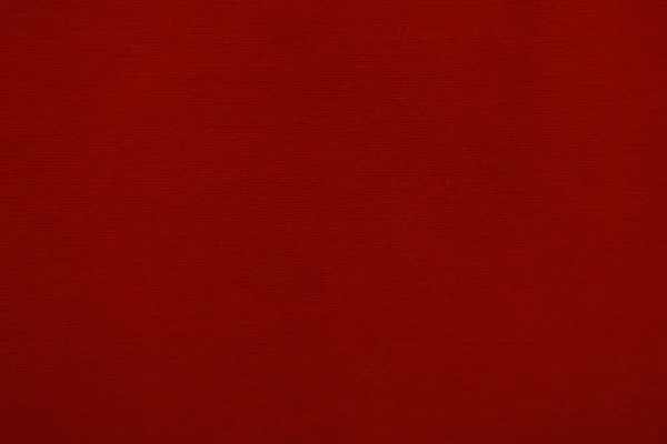 以红色天鹅绒面料为背景 柔软而光滑的纺织材料制成的空红色面料背景 文本是有空间的 — 图库照片