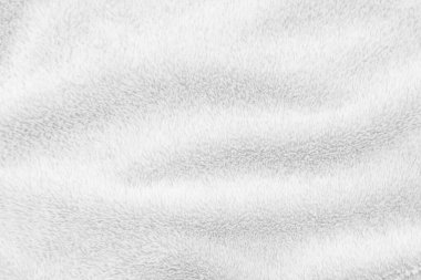 White clean wool texture background. light natural sheep wool. white seamless cotton. texture of fluffy fur for designers. close-up fragment white wool carpet.	