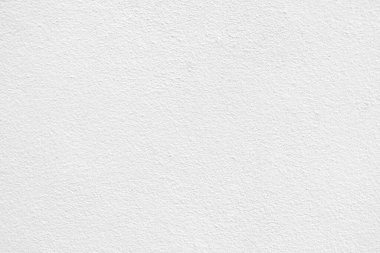 Seamless texture of white cement wall a rough surface, with space for text, for a background.	