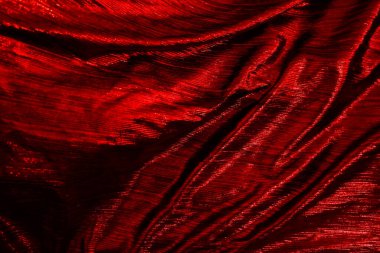 Red reflect velvet fabric texture used as background. Empty red fabric background of soft and smooth textile material. There is space for text.	