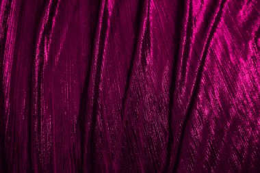 Red reflect velvet fabric texture used as background. Empty red fabric background of soft and smooth textile material. There is space for text.	