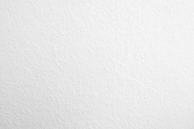 Seamless texture of white cement wall a rough surface, with space for text, for a background..	