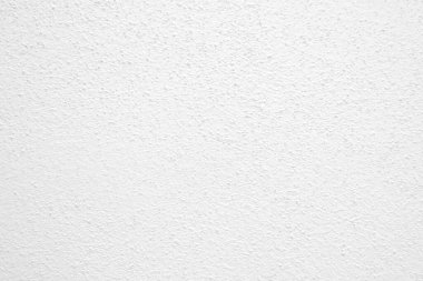 Seamless texture of white cement wall a rough surface, with space for text, for a background..	