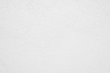Beyaz beton duvarın pürüzsüz dokusu kaba bir yüzey, metin için boşluk, arkaplan için alan.
