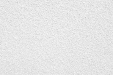 Seamless texture of white cement wall a rough surface, with space for text, for a background..	