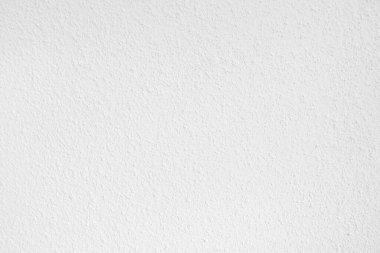 Seamless texture of white cement wall a rough surface, with space for text, for a background..	