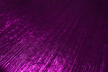purple bokeh velvet  fabric texture used as background. Empty purple fabric background of soft and smooth textile material. There is space for text.	