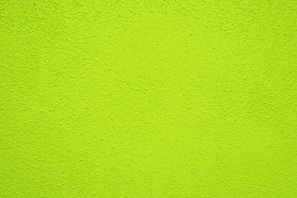 石灰绿色水泥墙的无缝隙质感粗糙的表面 有文字空间作背景 — 图库照片